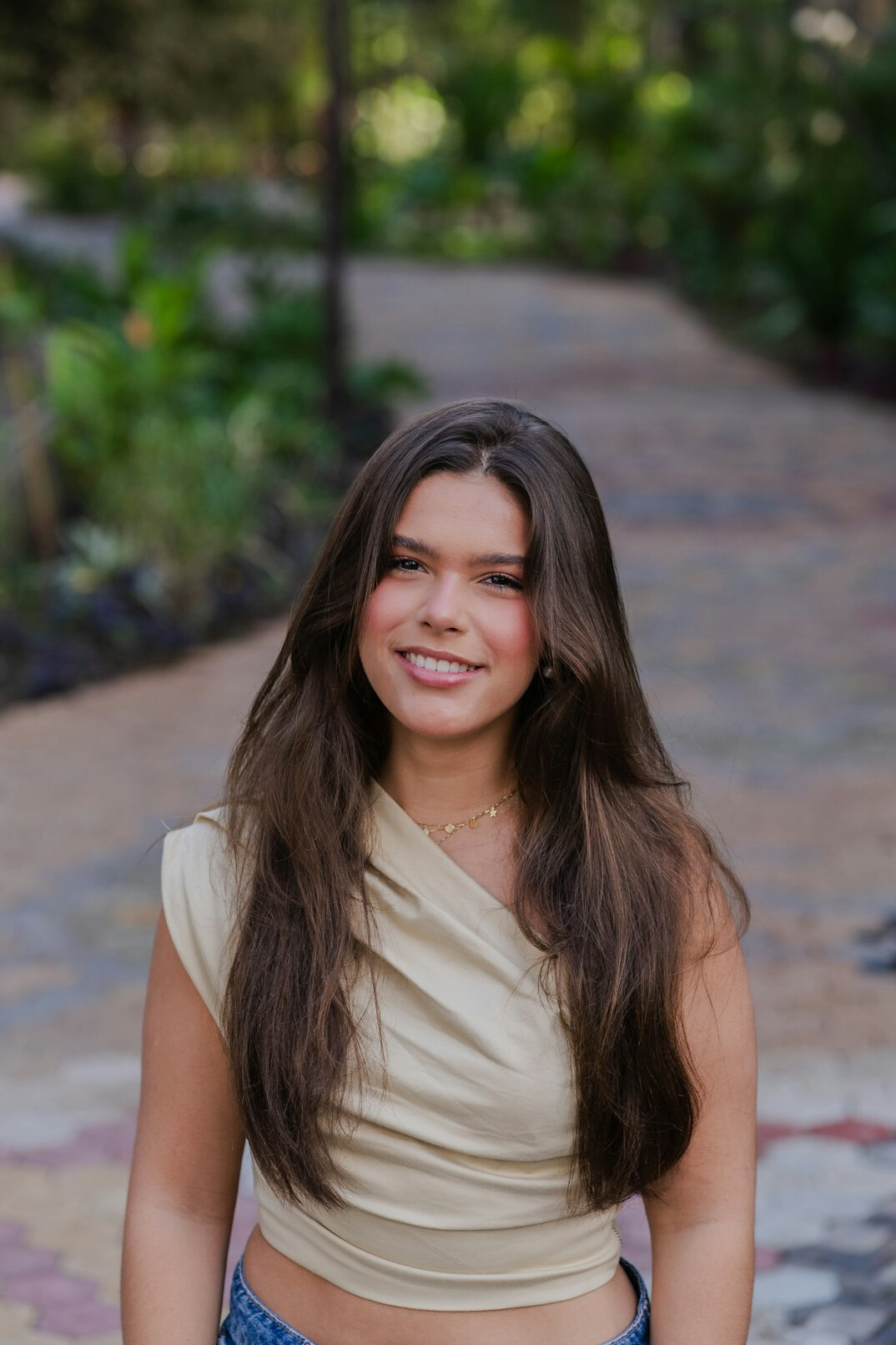 Portrait of a smiling Brazilian woman in a blazer