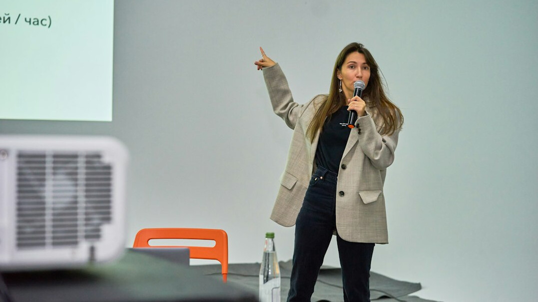 confident speaker on stage